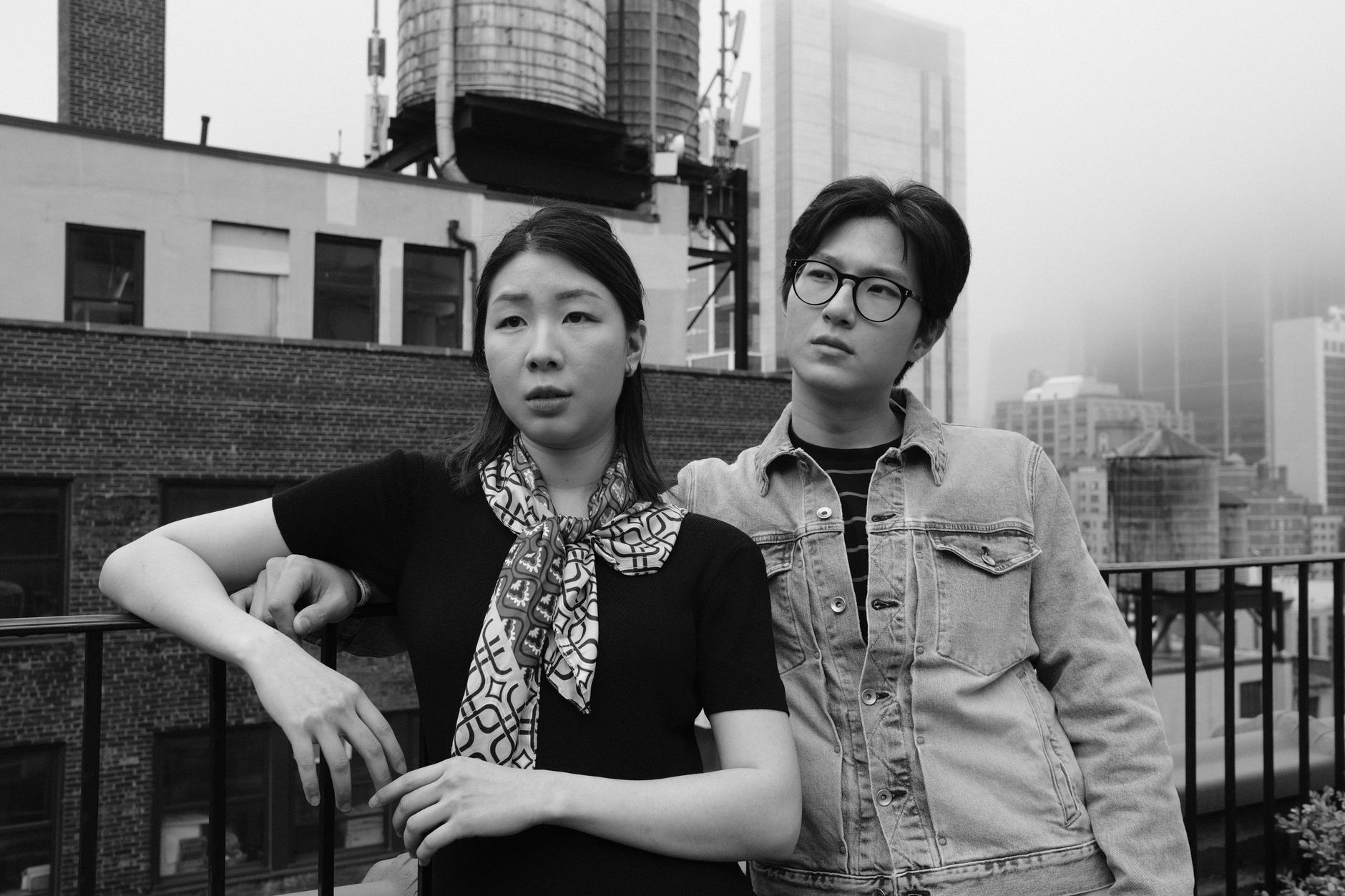 Nia and Erik in a black-and-white city portrait